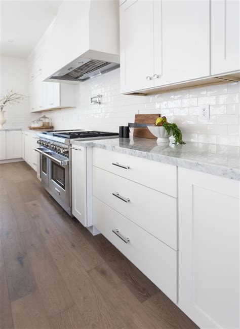 stainless steel backsplash tiles with white cabinets|bold backsplashes with white cabinets.